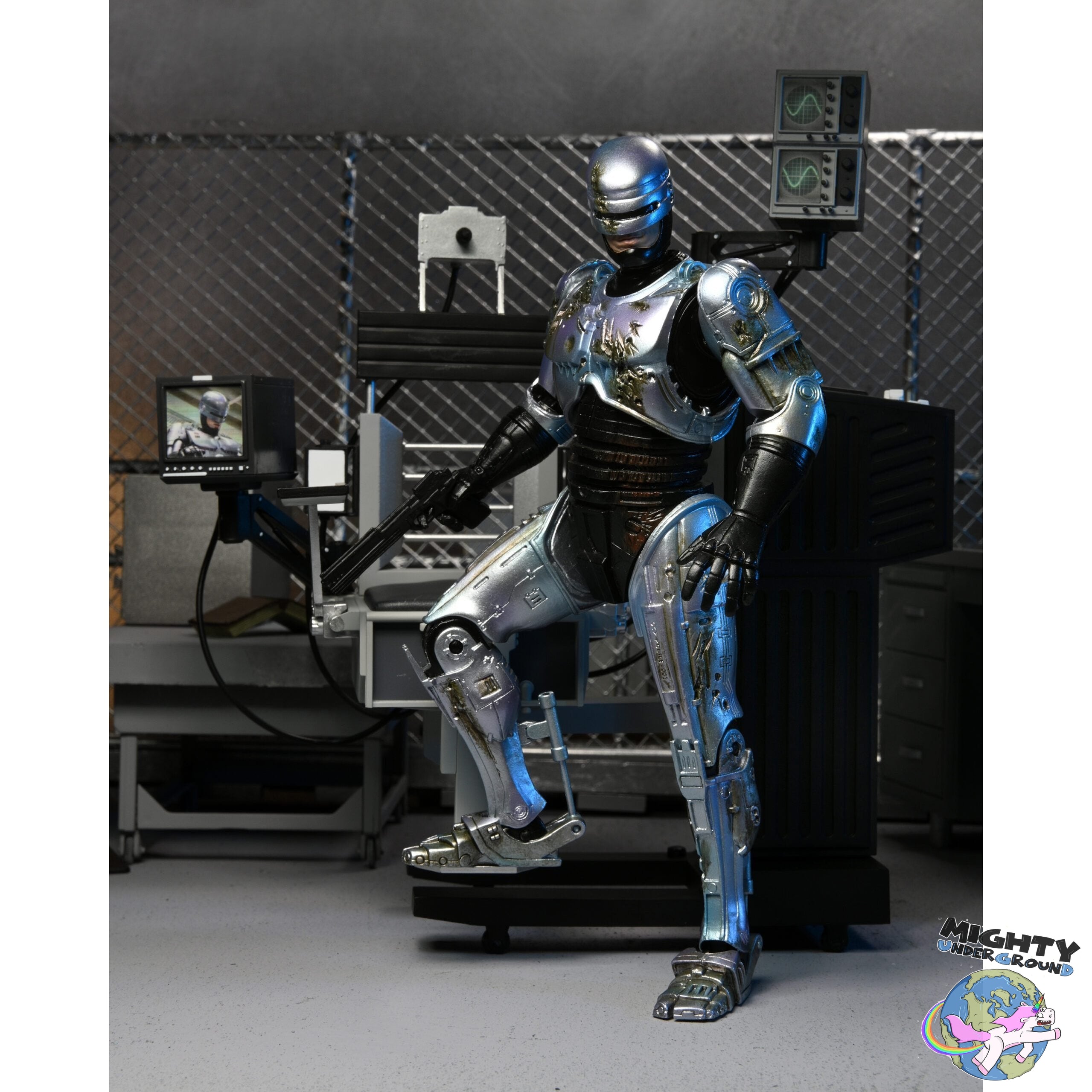 RoboCop: Ultimate Battle Damaged RoboCop with Chair-Actionfiguren-NECA-Mighty Underground